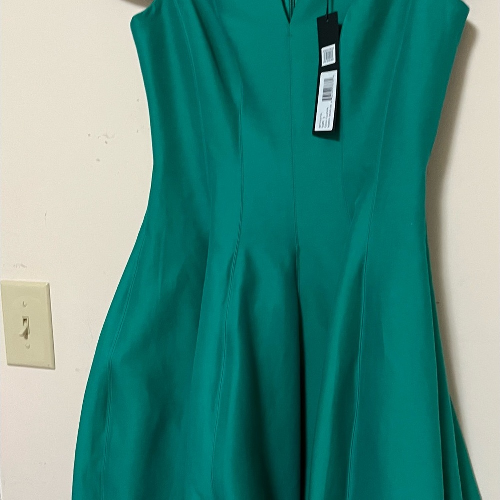 Halston dress . New with tags. Never worn